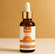 A bottle of Relax Vitamin C Serum with a dropper, labeled for brightening skin and reducing dark spots.