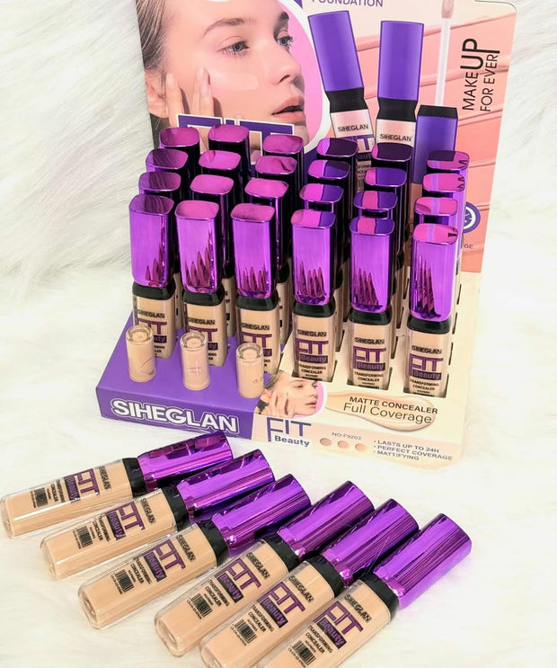 A tube of SHEGLAM FIT Beauty Transforming Concealer with a creamy texture and full coverage.